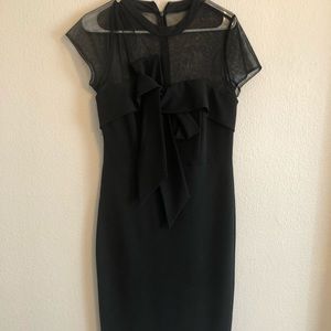Elegant black dress with sheer top